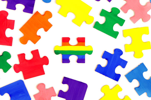istock LGBT concept. Rainbow colored puzzle isolated on white background. Gay Pride. Concept of equality, acceptance of sexual minorities lesbian, gay, bisexual, transgender. 1290480196