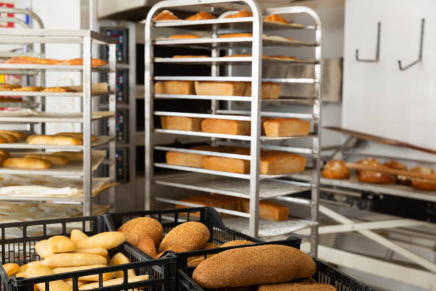 istock different types of bread in box and truck in bakery 1290482398