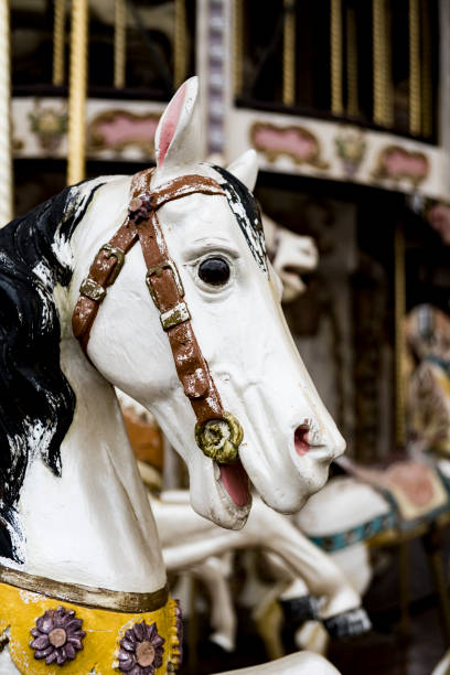 istock Decorative white head of horse from carousel 1290482627