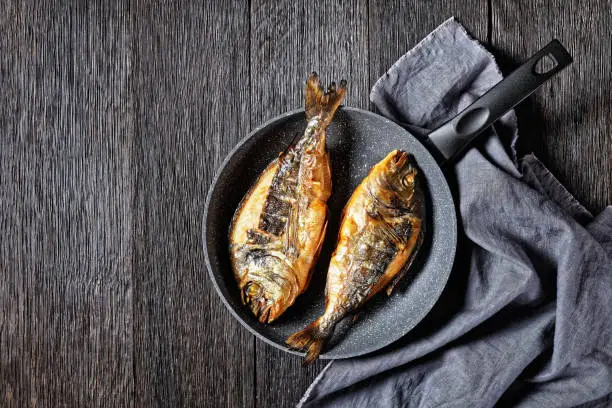 Photo of hot smoked gilt-head sea bream, orata fish