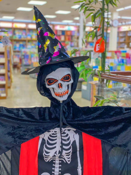 istock Funny skeleton Halloween decoration at the bookstore 1290482965
