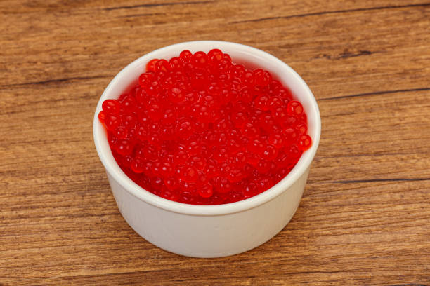 istock Red salmon caviar in the bowl 1290485251