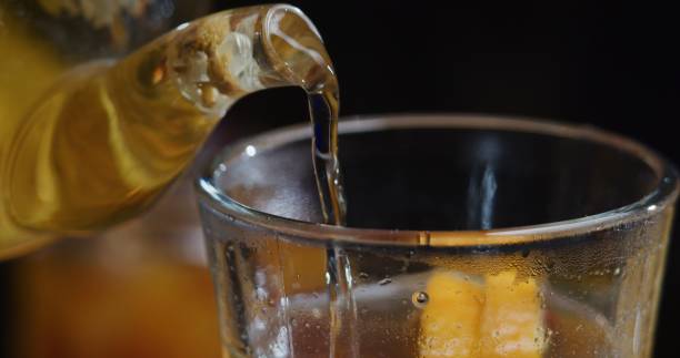 istock Preparing orange, rosemary and chamomile hot toddy 1290485775