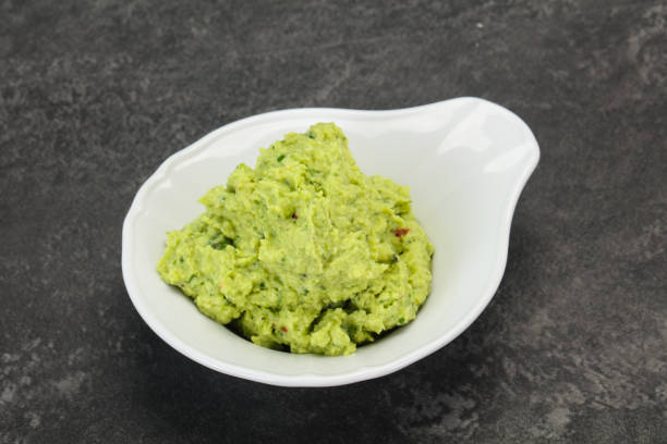 istock Avocado guacamole sauce with chili pepper 1290487113