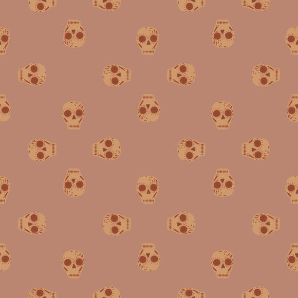 istock Decorative seamless pattern with little beige skull decor ornament. Pale palette horror backdrop. 1290488308