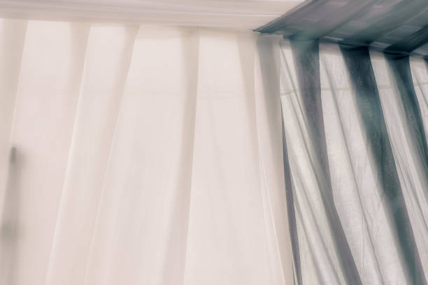 istock White and gray curtain background, photo studio fabric screen backdrop 1290489323
