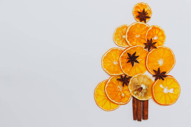 istock Christmas edible tree from dried orange and spice 1290492352