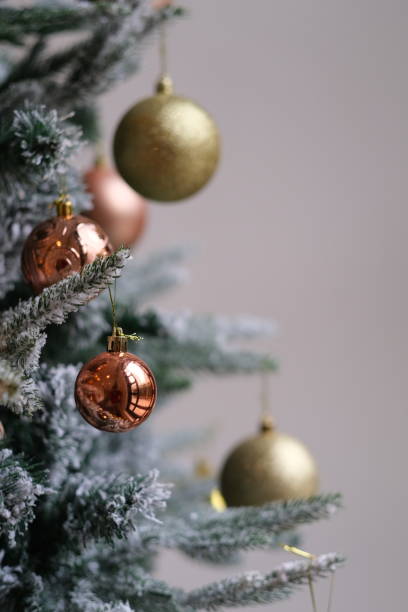 istock close up bauble on Christmas tree. white background 1290492430