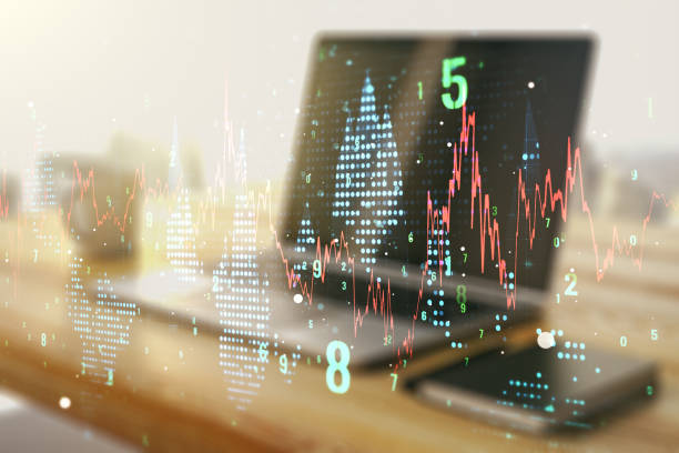 istock Abstract creative financial graph and modern desktop with pc on background, financial and trading concept. Multiexposure 1290493658
