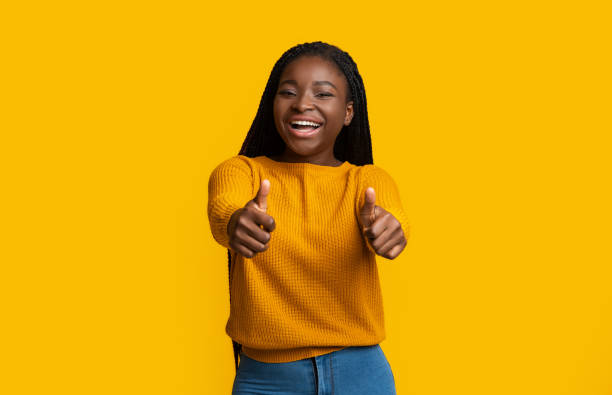 istock Everything Is Great. Positive Black Woman Gesturing Thumbs Up At Camera 1290494282