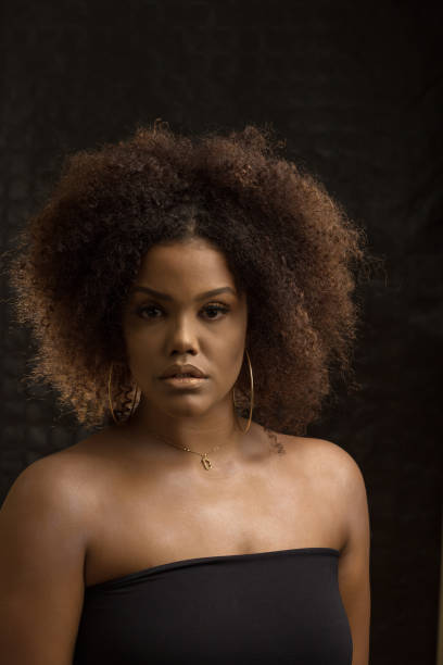 istock Stylish black woman with Afro hairstyle 1290497376