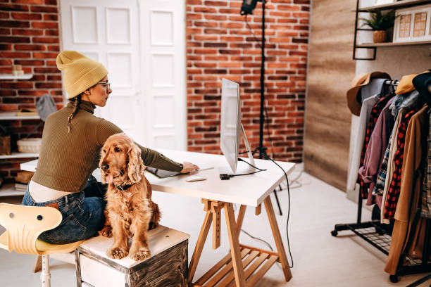 istock Woman looks at her pictures on the computer 1290497487