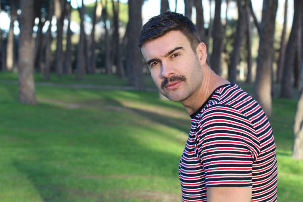 istock Attractive young man with retro mustache 1290498327