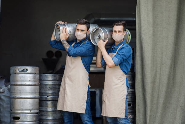istock Covid-19 quarantine, work in brewery warehouse for strong man 1290499786