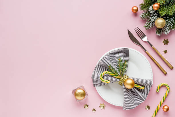 istock Beautiful Christmas table setting. New year decoration. Top view 1290501334
