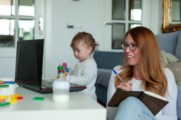 istock Mother and daughter home office. Lockdown concept. 1290504768
