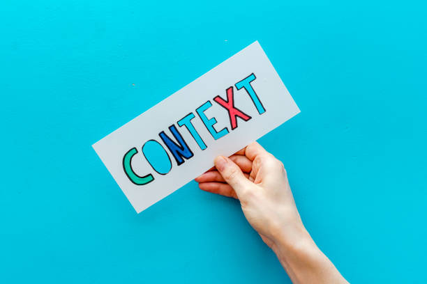 istock Context marketing concept. Word Context on paper banner, top view 1290505742