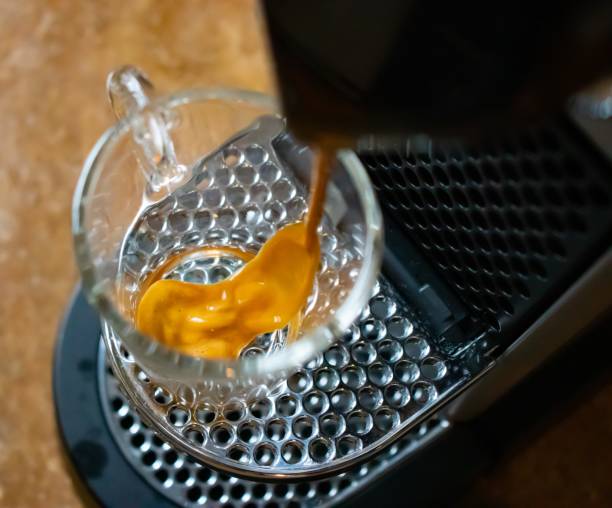 istock Espresso coffee brewing process from Typical Italian coffee espresso machine 1290505881