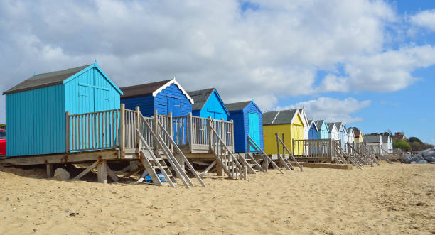 istock Colourful Beach Huts on Felixstowe Beach 1290507567