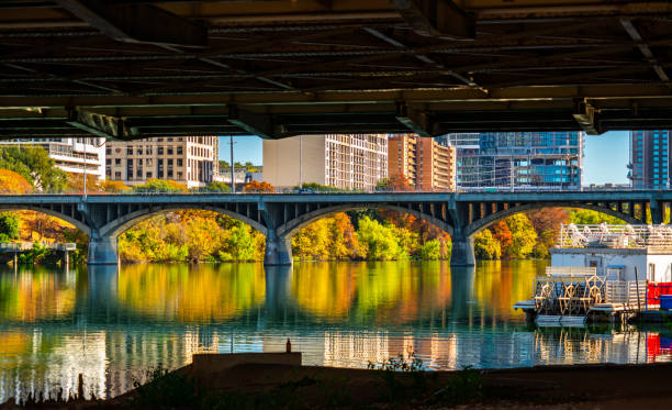 istock Under Congress Bridge Fall Reflections of Austin Texas Skyline 1290512912