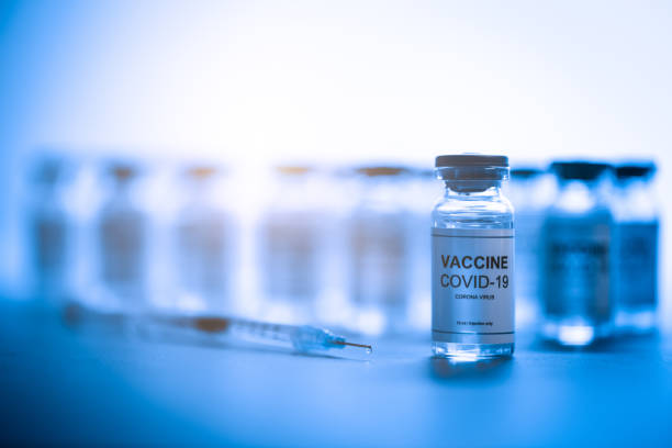 Coronavirus covid-19 vaccine Vials with covid-19 coronavirus vaccine on laboratory table ready to be distributed for prevention of infection with this virus covid 19 vaccine photos stock pictures, royalty-free photos & images