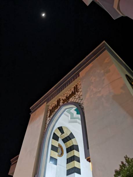 istock White Mosque and Moon at Night 1290515305