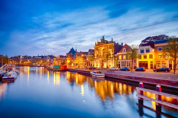 istock Night View of Harlem Sight on Spaarne River On The Background At twilight.Horizontal Image Composition 1290518738