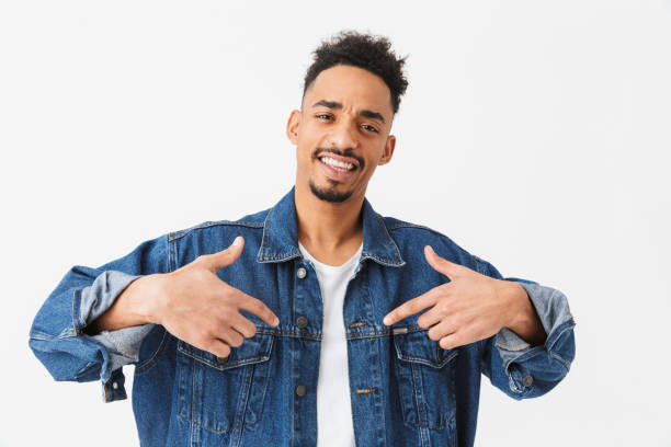 istock Happy african man in denim jacket posing 1290537257