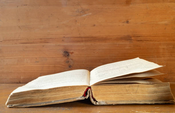 istock Revealling book rests upon wooden regiment 1290538518