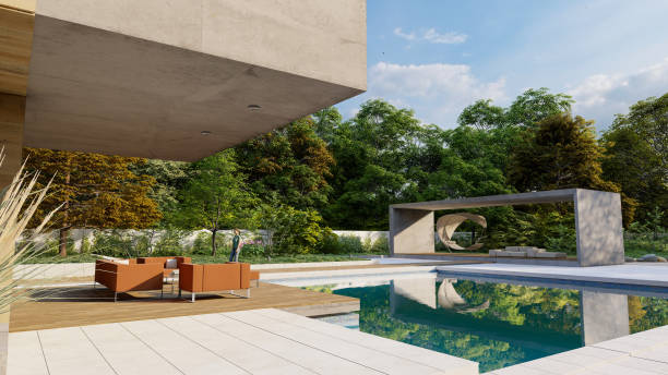 istock Modern house with lounge area by the pool 1290538738