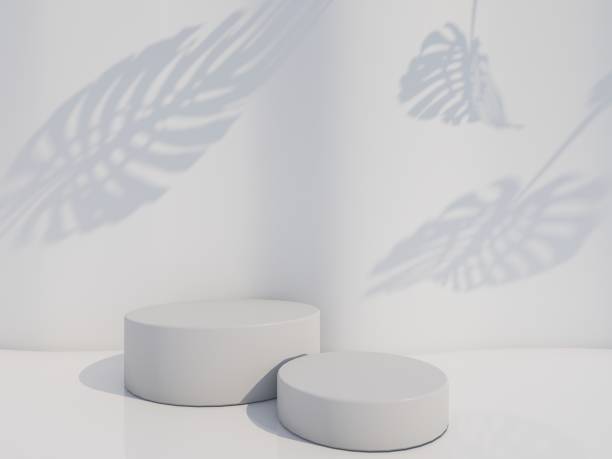 istock Cosmetic bottle podium with green  leaf on white  background. 3d rendering. 1290540745