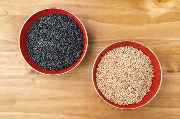 istock black and wihite sesame in wooden plate 1290540850