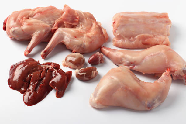 istock Chopped rabbit carcass on a white background. Closeup. Top view 1290541908