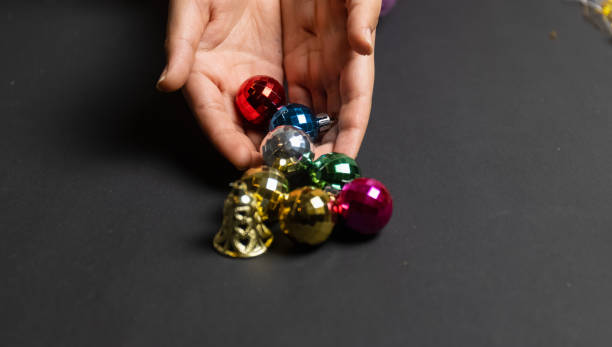 istock Christmas balls in black background 1290542922