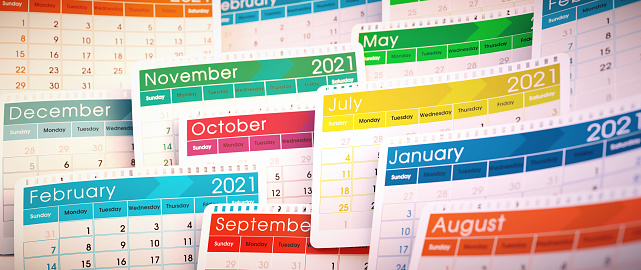A vertical stack of multicolored 2021 calendar pages side by side, wide horizontal composition