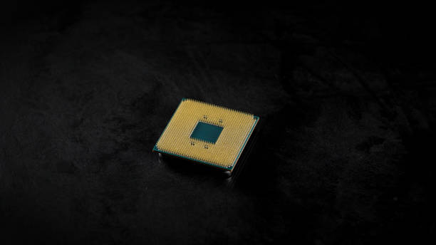 istock CPU. Studio macro photography of a computer processor. Gold plated contacts are visible in the frame 1290545308