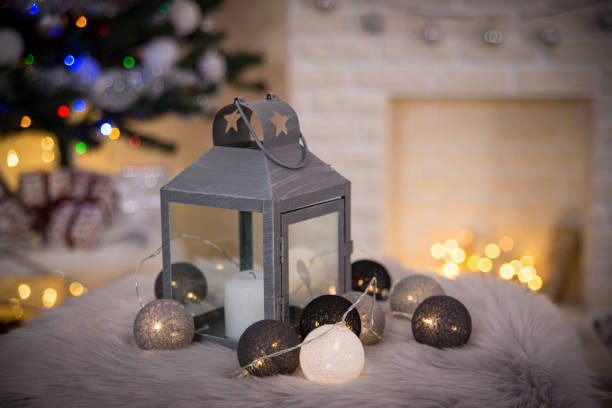 istock Cosy interior with a fireplace decorated in Christmas style 1290545351