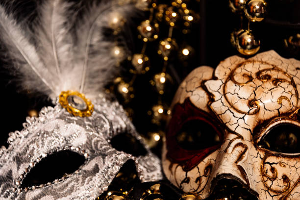 istock Venetian masks for carnival on a black background 1290546551