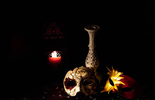 istock Venetian masks for carnival on a black background 1290546756