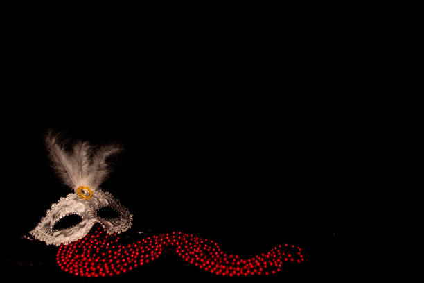 Venetian masks for carnival on a black background