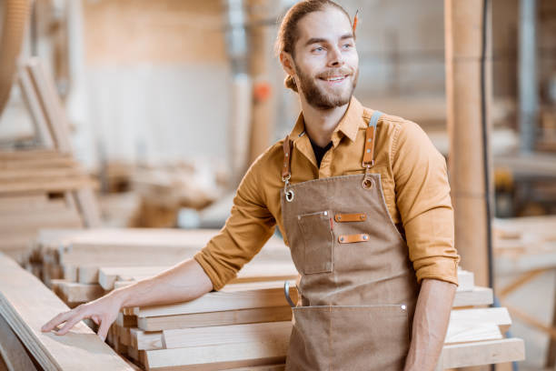 istock Portrait of a cheerful carpenter 1290549082