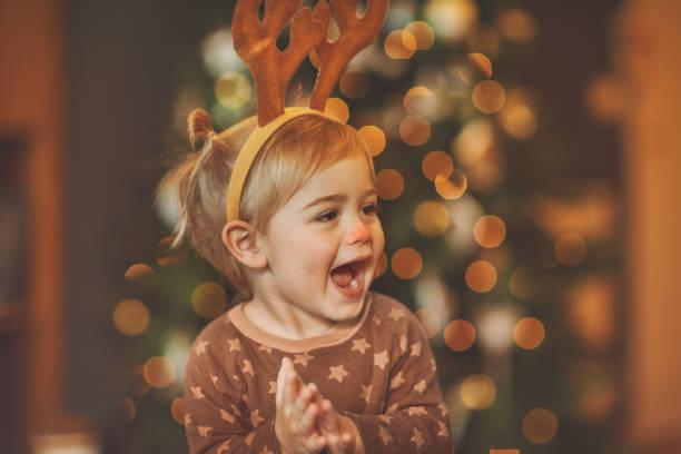 istock Baby on kid's Christmas party 1290549196