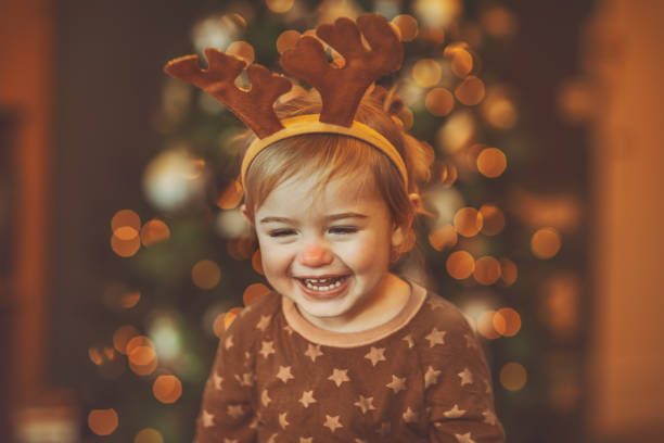 istock Baby on kid's Christmas party 1290549277