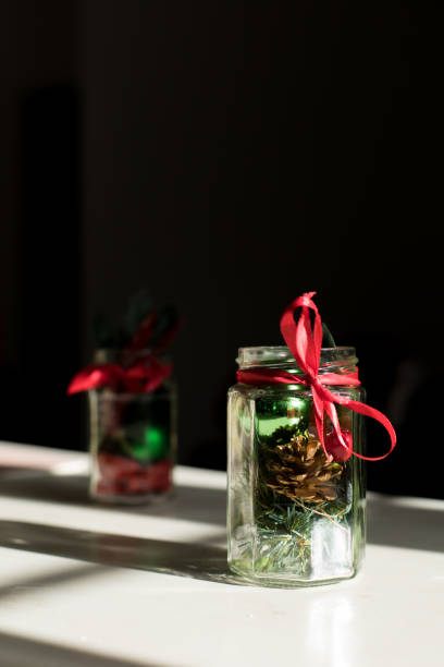 istock Jar filled with Christmas Decorations 1290553453