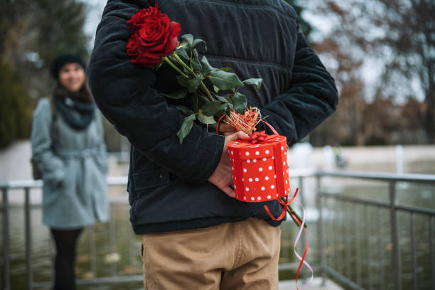 istock Man surprise his girlfriend on Valentine`s Day. 1290553526