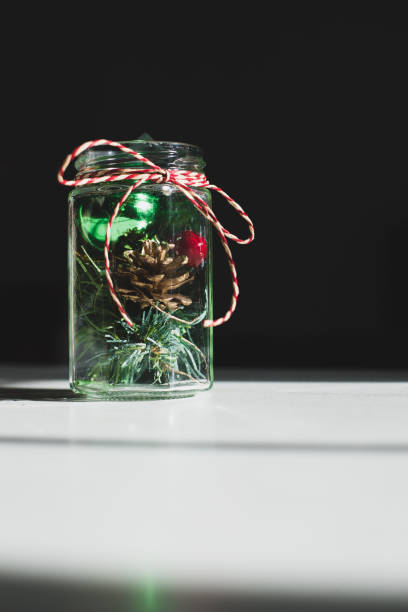 istock Jar filled with Christmas Decorations 1290554878