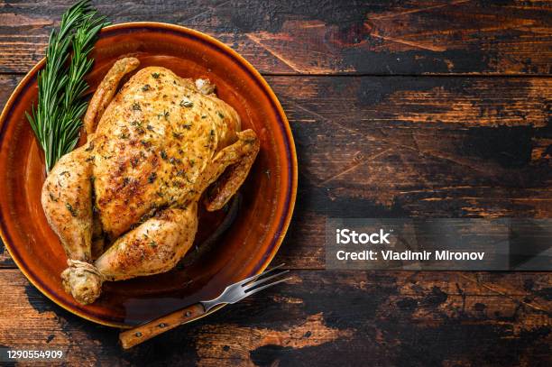 Delicious Baked Chicken On Wooden Table Dark Background Top View Copy Space Stock Photo - Download Image Now