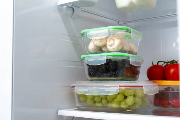 istock Storage containers with fresh food in a fridge 1290561175