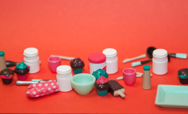 istock flat lay image of plastic toy tableware with cakes on pastel pink background 1290561830