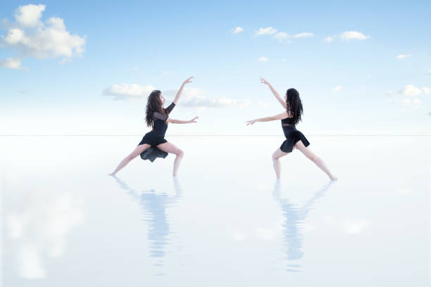 istock Ballet dancer walking on the water 1290563369